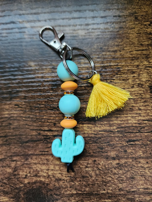 Light Blue and Orange Catus Bar Keychain